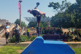 Defying gravity at American Parkour Festival in Rosslyn at Gateway Park. (WTOP/Kathy Stewart)