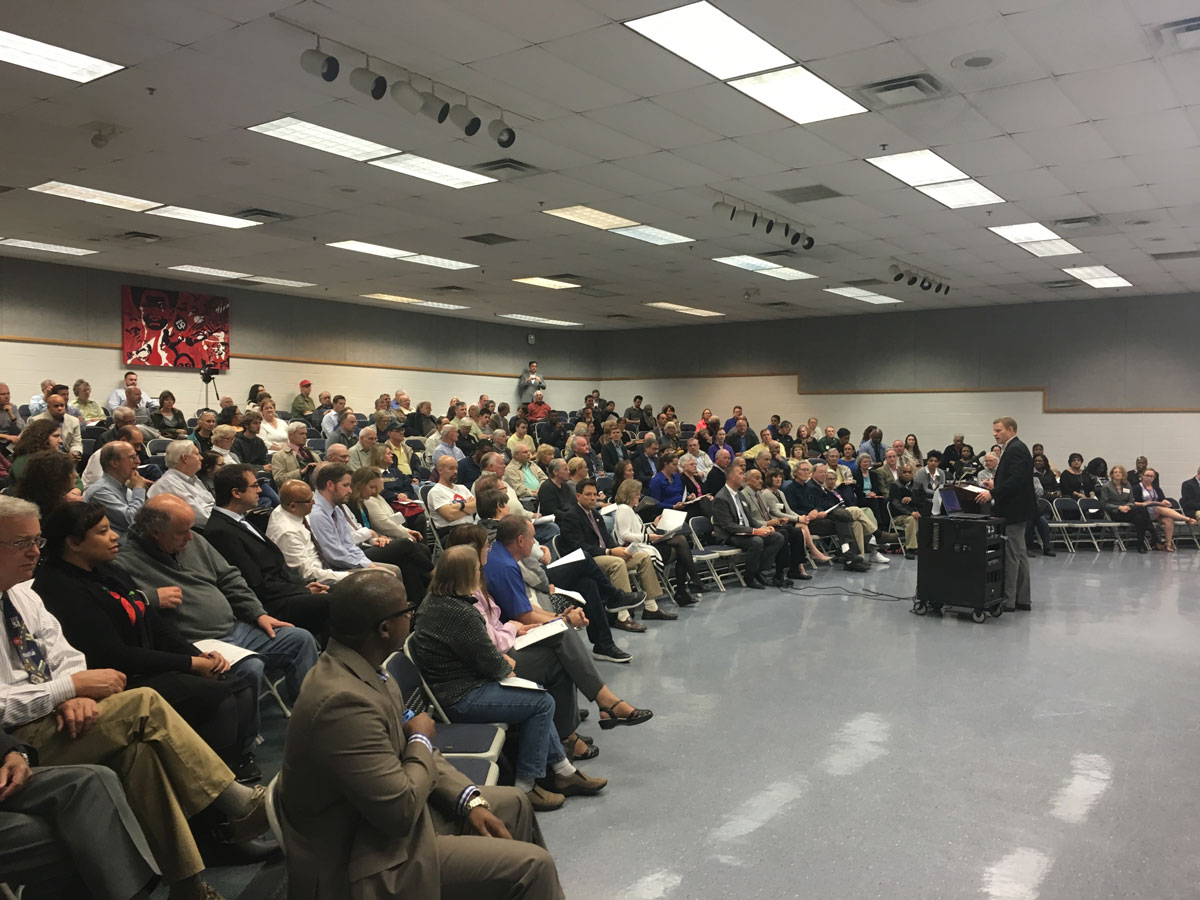 At a public meeting for the Embark Richmond Highway project, residents packed an auditorium at Walt Whitman Middle School in Alexandria to hear from project planners and local lawmakers about the project’s progress. (WTOP/Mike Murillo)