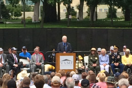 Marine Captain Dale Dye, a Vietnam War veteran, gives the keynote address at an annual ceremony honoring veterans at the Vietnam Veterans Memorial on Monday. (WTOP/Dick Uliano)