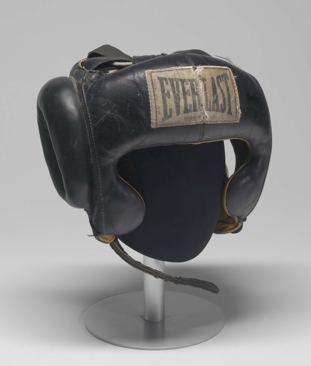 Boxing gear worn by Muhammad Ali circa 1973. The headgear is an item in the collection of the Smithsonian National Museum of African American History and Culture. (Courtesy Collection of the Smithsonian National Museum of African American History and Culture)