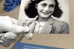 The most frequently published photograph of Anne Frank is prepared for display Tuesday, Aug. 3, 2004, at the Holocaust Museum Houston. The photo is one of dozens from the Frank family album to be on exhibit at the museum from Thursday through Dec. 31. Anne Franks' diary was published after the end of World War II making her arguably the most famous of the nearly 6 million victims of Hitler's attempt to exterminate the Jews. (AP Photo/Pat Sullivan)