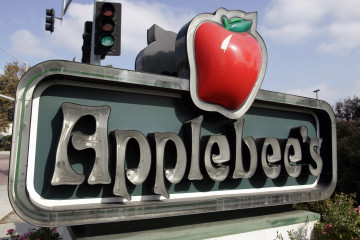 Exterior of an Applebee's sign near their restaurant in Milpitas, Calif., Tuesday, Oct. 30, 2007. Shareholders of the bar-and-grill chain Applebee's International Inc. on Tuesday approved a $1.9 billion buyout offer from pancake house operator IHOP Corp. (AP Photo/Paul Sakuma)
