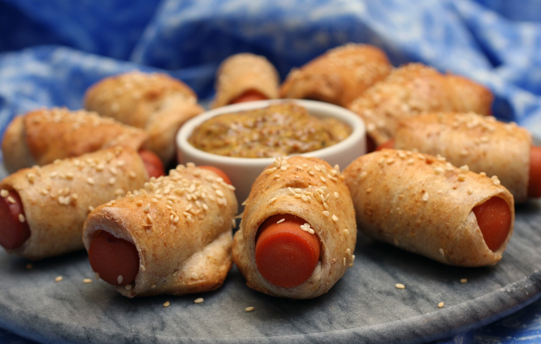 **FOR USE WITH AP LIFESTYLES**      Low-fat Pigs in a Healthy Blanket are seen in this Sunday, Oct. 19, 2008 photo. You can assure your guests that these usually high fat but always tasty finger foods have kept the flavor but reduced the fat. Whole-wheat pizza dough and nearly fat-free hot dogs keep these Low-fat Pigs in a Healthy Blanket guilt free. (AP Photo/Larry Crowe)