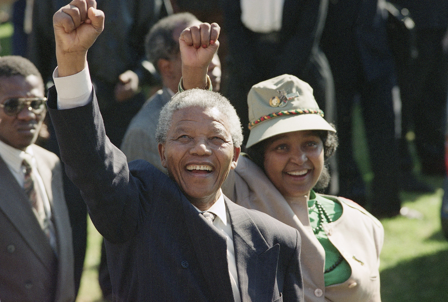 FILE - In this July 7, 1991, file photo, newly-elected African National Congress President Nelson Mandela and his wife, Winnie, greet the crowd after arriving at a rally and a week-long national ANC conference held inside South Africa for the first time in 30 years. South Africa's President Jacob Zuma said, Thursday, Dec. 5, 2013, that Mandela has died. He was 95. (AP Photo/John Parkin, File)