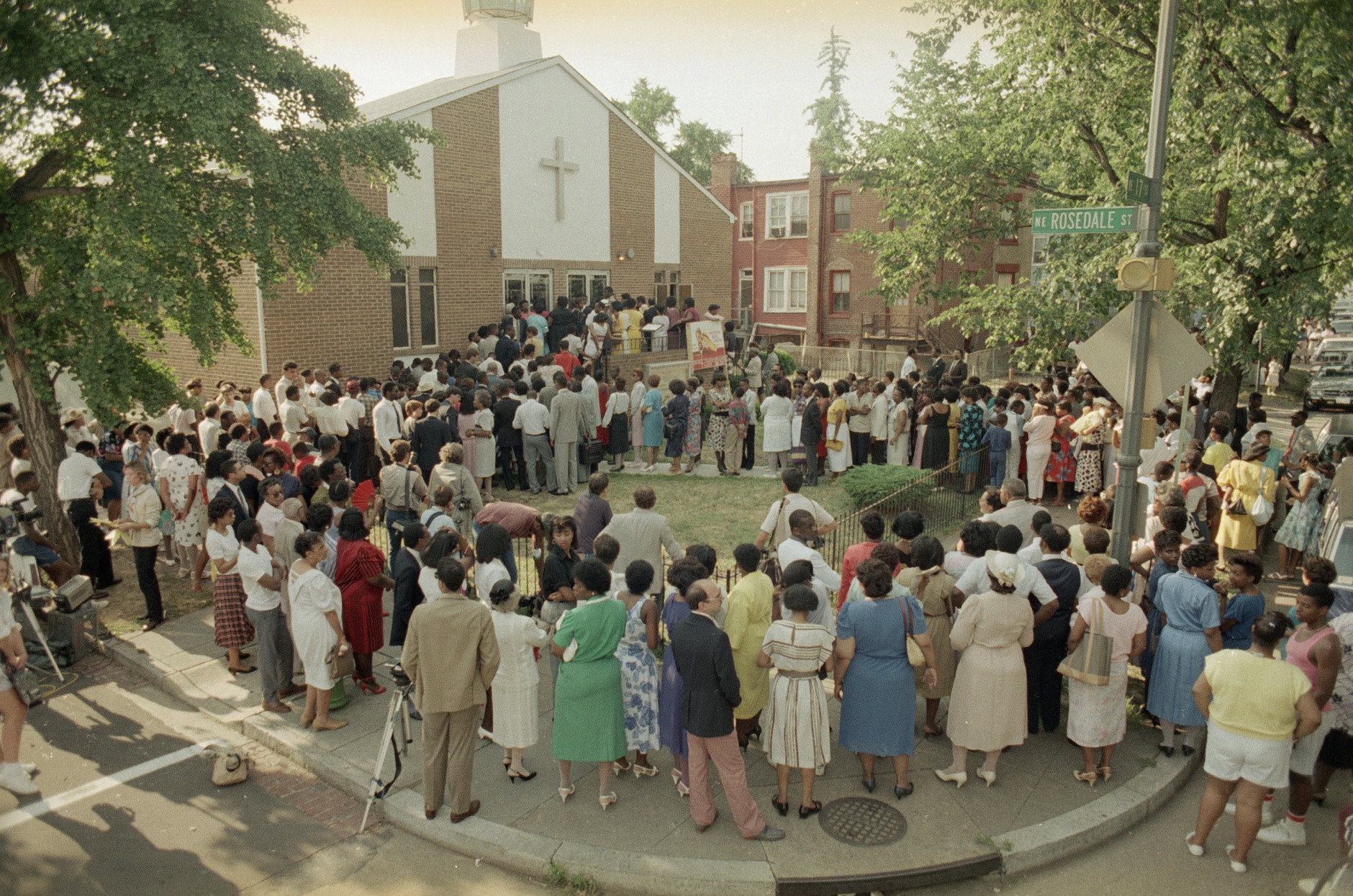 Friends gather outside the Pilgrim A.M.E. Church in Washington, June 22, 1986, for college basketball star Len Bias' wake.  Bias, who was headed for a pro career with the Boston Celtics, died of cardiac arrest in this Univerity of Maryland dormitory on Thursday.  (AP Photo/Tom Reed)