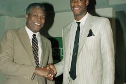 Len Bias poses with Boston Celtics' coach, K.C. Jones in Boston, June 17, 1986.  (AP Photo)