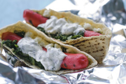 In this image taken on July 30, 2012, Greek spanakopita hot dogs are shown in Concord, N.H. (AP Photo/Matthew Mead)