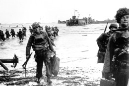 Carrying full equipment, American assault troops move onto a beachhead code-named Omaha Beach, on the northern coast of France on June 6, 1944, during the Allied invasion of the Normandy coast. (AP Photo)
