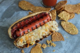 This June 22, 2015 photo shows a hot dog with Korean gochujang in Concord, N.H. Gochujang - a thick, Korean chili paste - is made from chili peppers, rice, fermented soy beans and salt. (AP Photo/Matthew Mead)
