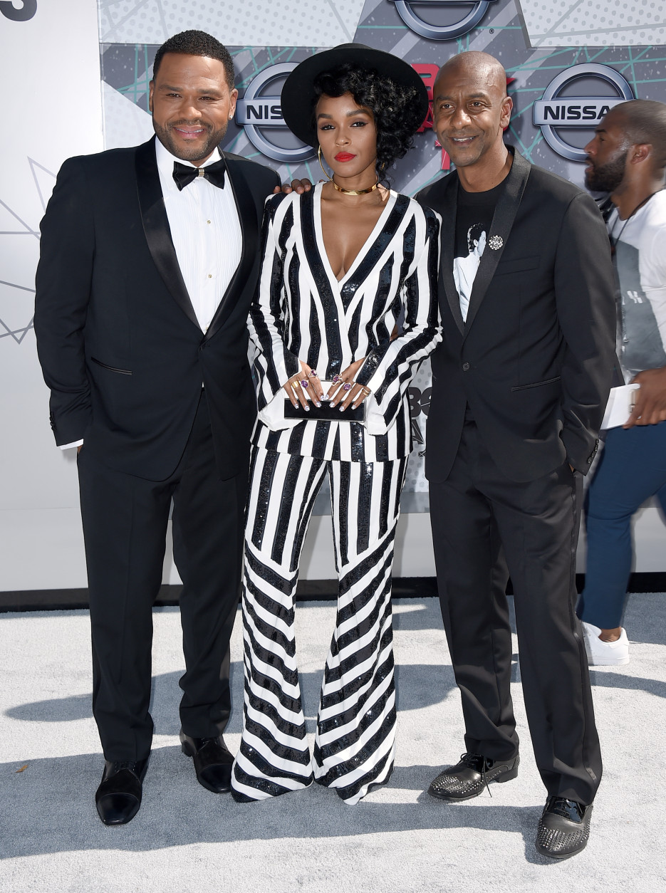 Anthony Anderson, from left, Janelle Monae and Stephen G. Hill, president of music programming and specials, BET Holdings, arrive at the BET Awards at the Microsoft Theater on Sunday, June 26, 2016, in Los Angeles. (Photo by Jordan Strauss/Invision/AP)