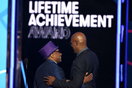 Spike Lee, left, presents the lifetime achievement award to Samuel L. Jackson at the BET Awards at the Microsoft Theater on Sunday, June 26, 2016, in Los Angeles. (Photo by Matt Sayles/Invision/AP)