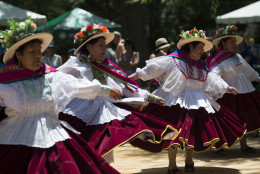 Peruvian dancers perform at the Smithsonian Folklife Festival in Washington, Wednesday, June 24, 2015. This years Smithsonian Folklife Festival focuses exclusively on Peru and its varied cultures, food and ecosystems. (AP Photo/Molly Riley)