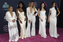 Members of Fifth Harmony, from left, Ally Brooke, Normani Kordei, Dinah Jane, Lauren Jauregui, and Camila Cabello arrive at the CMT Music Awards at the Bridgestone Arena on Wednesday, June 8, 2016, in Nashville, Tenn. (Photo by Sanford Myers/Invision/AP)