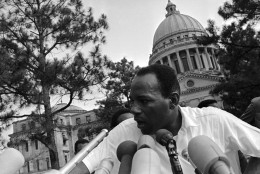 James Meredith, first speaker at a giant rally held on the grounds of the Mississippi State Capitol at Jackson, June 26, 1966, tells of the purpose of the march he initiated on June 5 at Memphis, Tenn.  The side and back of Meredith's head was shaven to remove buckshot after he was shot from ambush on June 6 near Hernando on the second day of his march. (AP Photo)