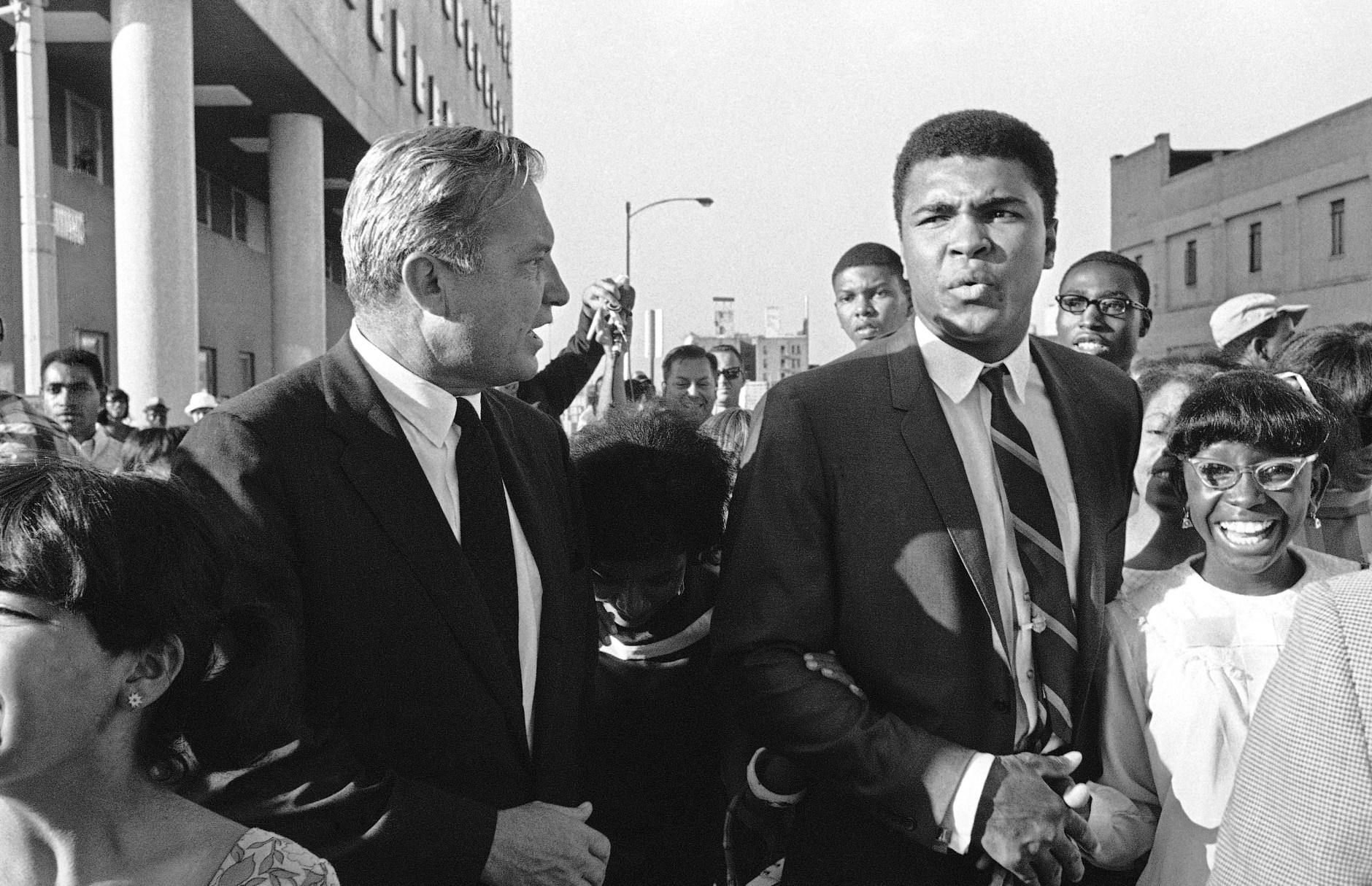 Muhammad Ali outside the Federal Courthouse after he had been found guilty on charges of refusing to be inducted into the Armed Forces on June 20, 1967 in Houston, Texas. (AP Photo)
