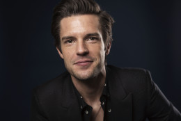 In this March 24, 2015 photo, musician Brandon Flowers poses for a portrait in New York. Flowers, the frontman of the rock band The Killers, is releasing a solo album, "The Desired Effect."  (Photo by Taylor Jewell/Invision/AP)