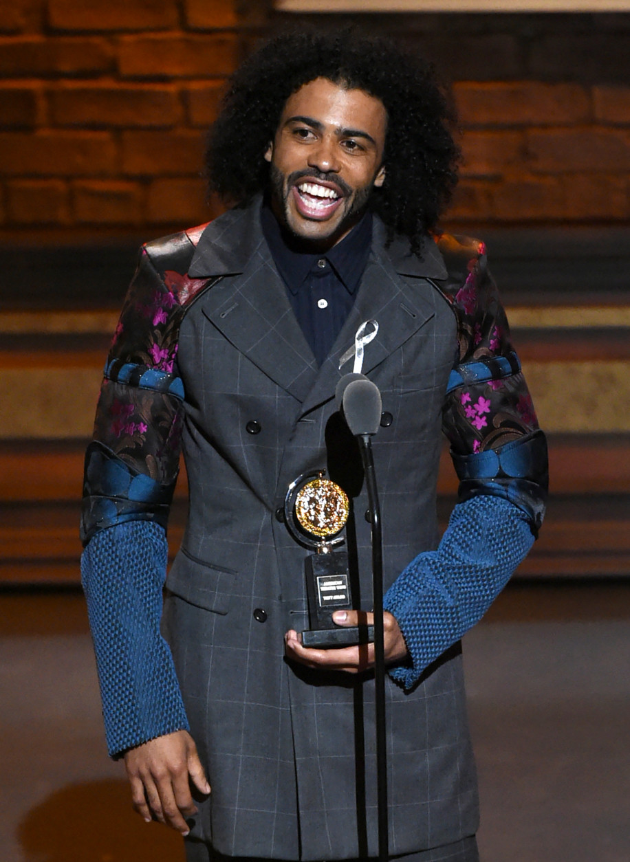 Daveed Diggs accepts the award for featured actor in a musical for "Hamilton" at the Tony Awards at the Beacon Theatre on Sunday, June 12, 2016, in New York. (Photo by Evan Agostini/Invision/AP)
