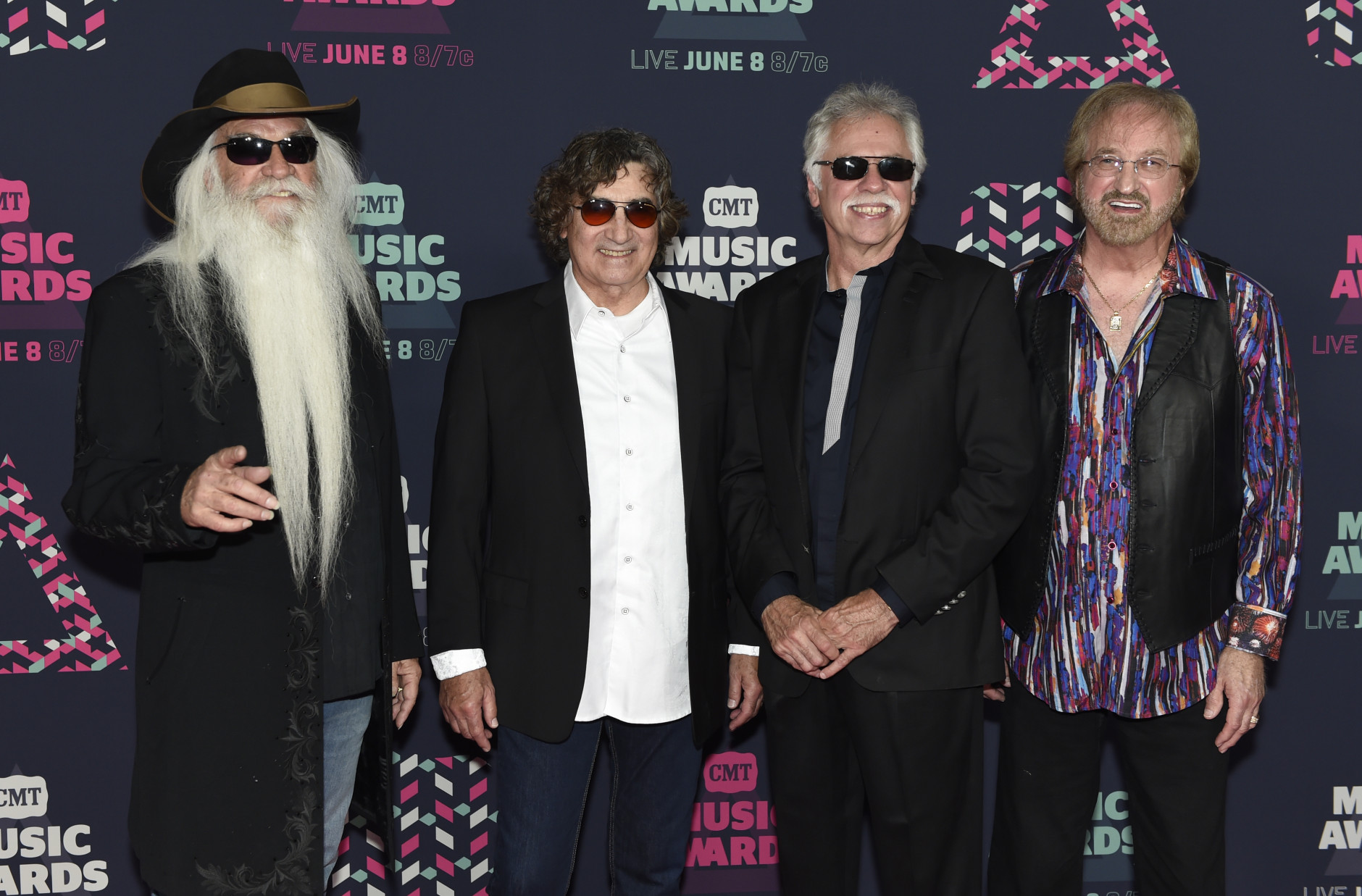 The Oak Ridge Boys, from left, William Lee Golden, Richard Sterban,  Joe Bonsall, and  Duane Allen arrive at the CMT Music Awards at the Bridgestone Arena on Wednesday, June 8, 2016, in Nashville, Tenn. (Photo by Sanford Myers/Invision/AP)