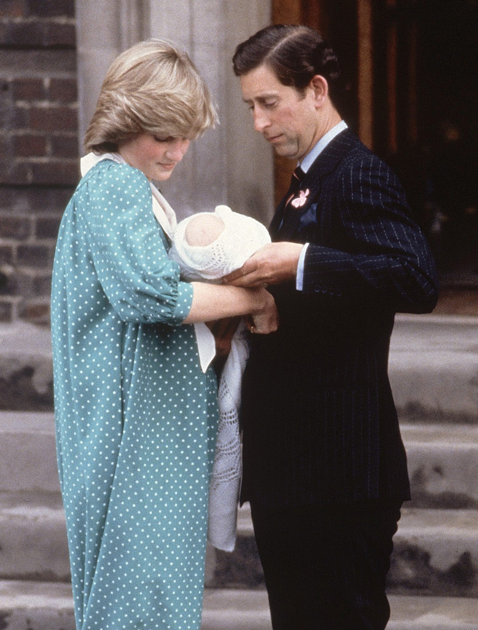 Britain's Prince Charles, Prince of Wales, with his wife Princess Diana,taking their newborn son Prince William, as they left St. Mary's Hospital, Paddington, London, June 22, 1982. (AP Photo/Staff/Redman)