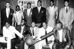 The cream of the collegiate basketball crop gets together for a class photo at the NBA draft in New York, June 17, 1986. Seated, from left to right are: Chuck Person, Chris Washburn, Johnny Dawkins, Len Bias and John Salley.  Back row, from left, are: Kenny Walker, Dwayne Washington, John Williams, Roy Tarpley, William Bedford and Brad Daugherty. (AP Photo/Richard Drew)