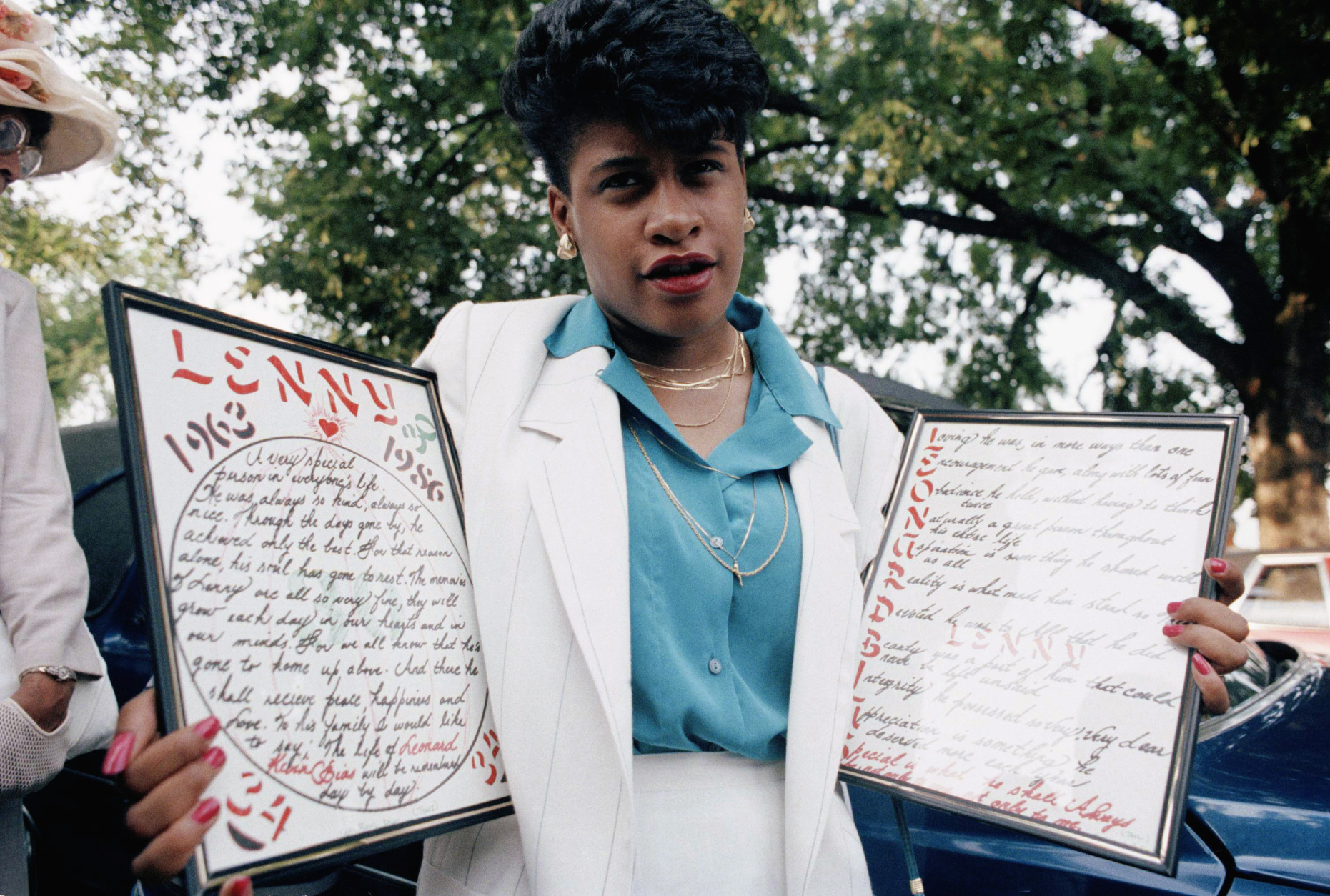 Sonya Cradle holds a poem she wrote in memory of her friend Len Bias, college basketball,  during a wake for Bias at a church Sunday evening on June 22, 1986 in Washington.   Bias died of an apparent heart attack in his University of Maryland dormitory Thursday. (AP photo/Tom Reed)
