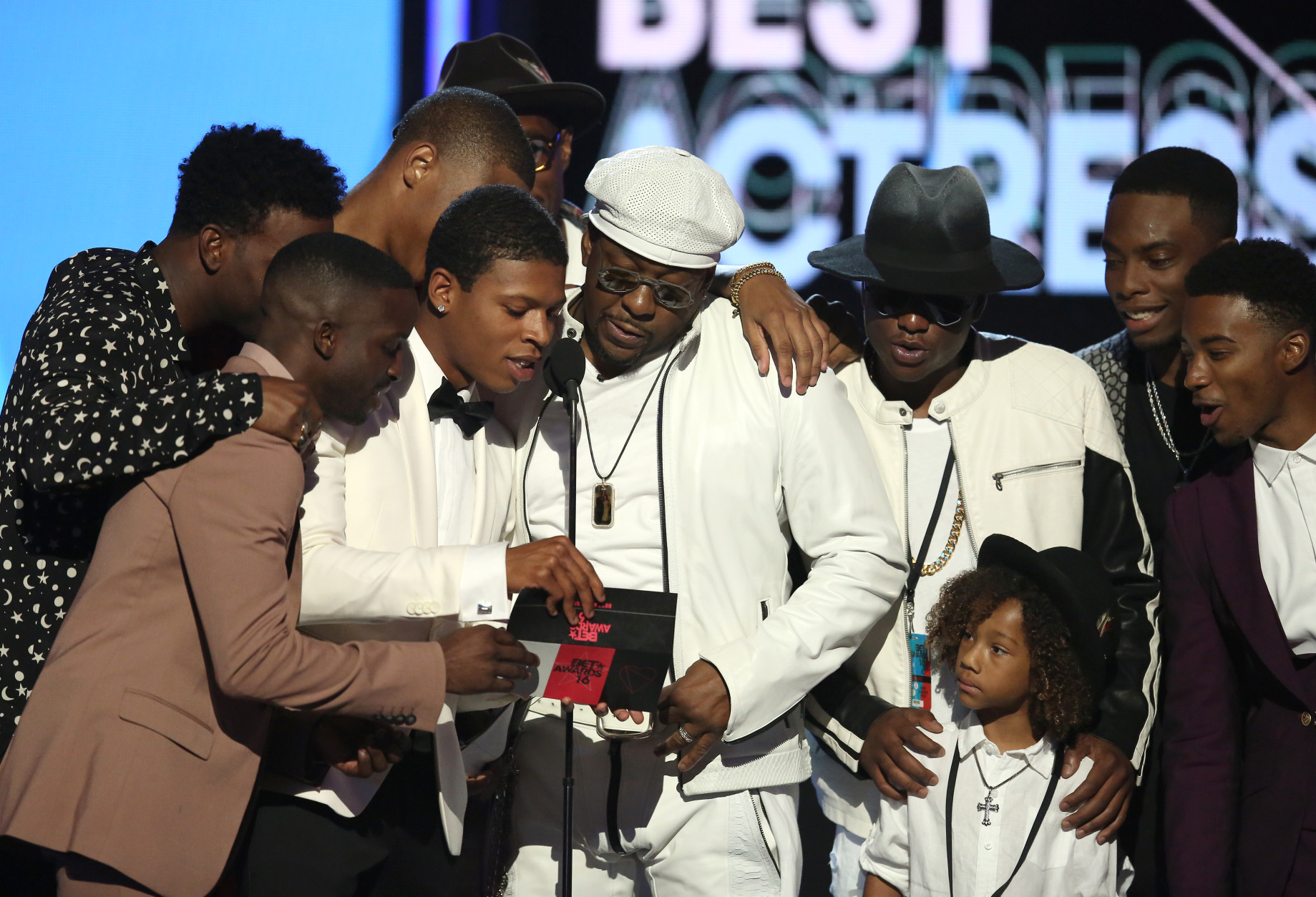 Bobby Brown, center, and the cast of New Edition present the award for best actress at the BET Awards at the Microsoft Theater on Sunday, June 26, 2016, in Los Angeles. (Photo by Matt Sayles/Invision/AP)