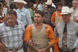 John William King, front, and Lawrence Russell Brewer are escorted from the Jasper County Jail Tuesday, June 9, 1998, in Jasper, Texas. King, Brewer and Shawn Allen Berry are charged with first degree murder in the death of James Byrd Jr.  Byrd Jr. was tied to a truck and dragged to his death along a rural East Texas road. (AP Photo/David J. Phillip)