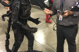 WTOP's Mike Murillo does the tough interviews -- like this one with a character from "Aliens." (WTOP/Mike Murillo)
