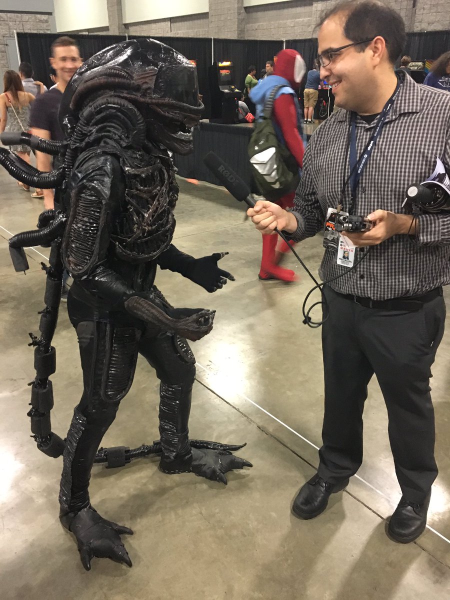 WTOP's Mike Murillo does the tough interviews -- like this one with a character from "Aliens." (WTOP/Mike Murillo)