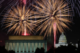 Fireworks light up the sky over the Lincoln Memorial, Washington Monument, and the U.S. Capitol on July 4, 2013 in Washington, DC. July 4th is a national holiday with the nation celebrating its 238th birthday.  (Photo by Mark Wilson/Getty Images)