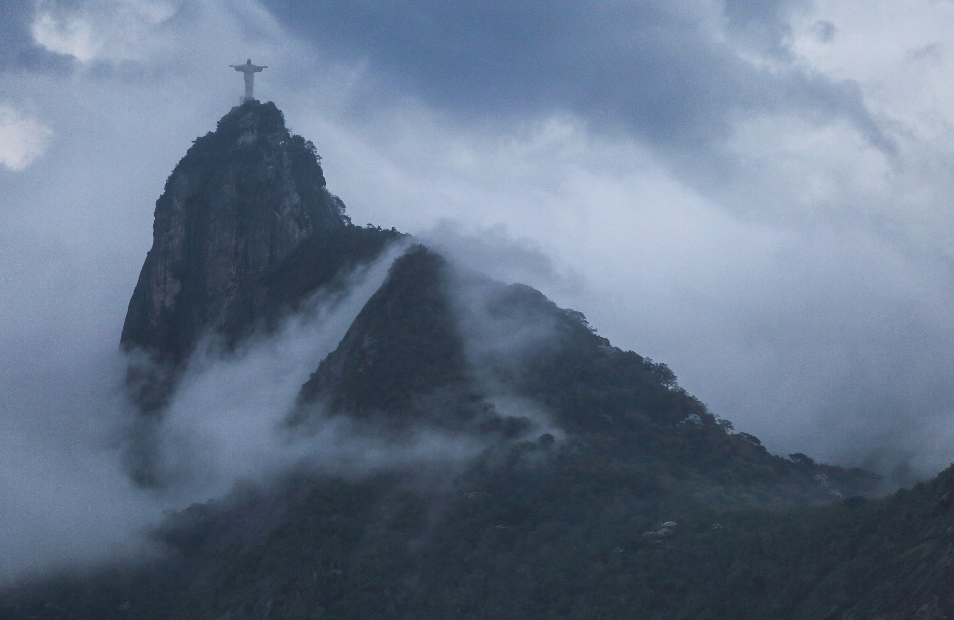 RIO DE JANEIRO, BRAZIL - FEBRUARY 06: The Christ the Redeemer statue is seen on Corcovado mountain on February 6, 2015 in Rio de Janeiro, Brazil. The city is gearing up to host the Rio 2016 Olympic Games. (Photo by Mario Tama/Getty Images)