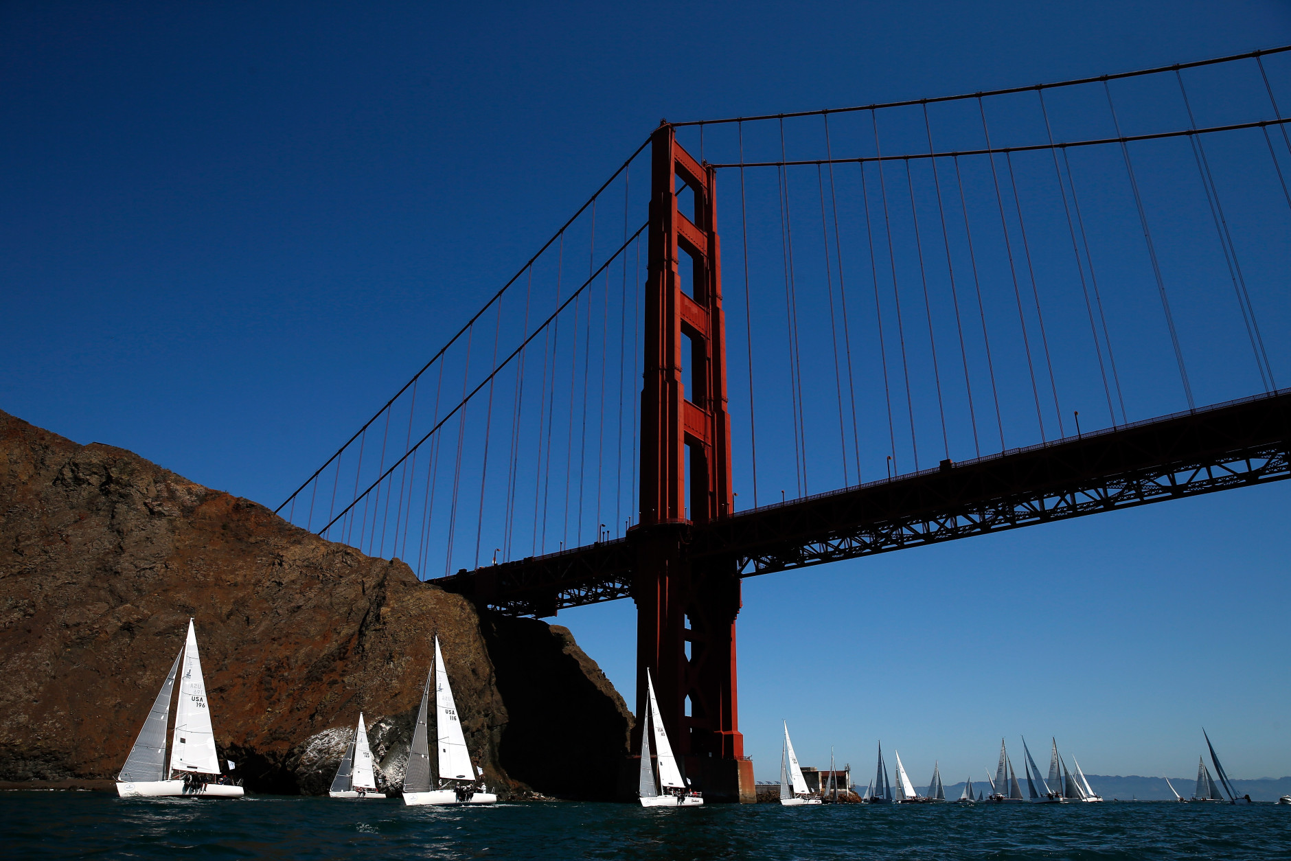 SAN FRANCISCO, CA - SEPTEMBER 18:  Boats in the J/105 class race under the Golden Gate Bridge during race 3 of the Rolex Big Boat Series in San Francisco Bay on September 18, 2015 in San Francisco, California.  (Photo by Ezra Shaw/Getty Images)