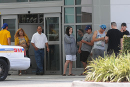 ORLANDO, FLORIDA - JUNE 12:  Families and friends await for information outside of the Orlando Regional Medical Center about loved ones who may have been victims of the mass shooting at the Pulse nightclub on June 12, 2016 in Orlando, Florida. The suspected shooter, Omar Mateen, was shot and killed by police. 50 people are reported dead and 53 were injured in what is now the worst mass shooting in U.S. history. (Photo by Gerardo Mora/Getty Images)
