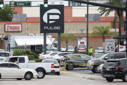 ORLANDO, FL - JUNE 12: Law enforcement officials investigate near the Pulse Nightclub where Omar Mateen allegedly killed at least 50 people on June 12, 2016 in Orlando, Florida. The mass shooting killed at least 50 people and injuring 53 others in what is the deadliest mass shooting in the country's history.  (Photo by Joe Raedle/Getty Images)