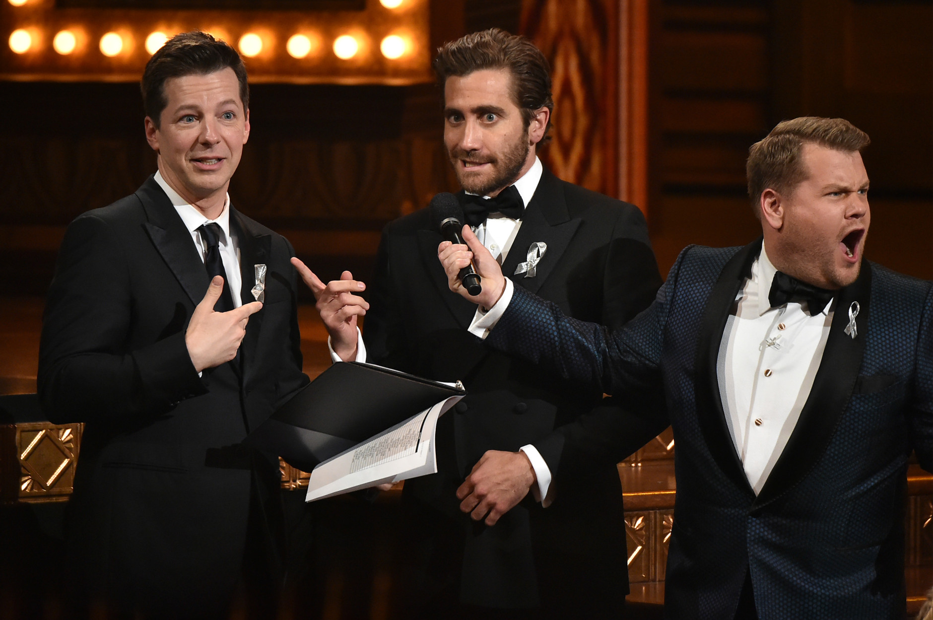 NEW YORK, NY - JUNE 12:  Presenter Sean Hayes and Jake Gyllenhaal speak onstage with host James Corden during the 70th Annual Tony Awards at The Beacon Theatre on June 12, 2016 in New York City.  (Photo by Theo Wargo/Getty Images for Tony Awards Productions)