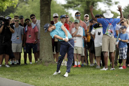 BETHESDA, MD - JUNE 23: Smylie Kaufman plays a shot on the fourth hole while fans watch during the first round of the Quicken Loans National at Congressional Country Club on June 23, 2016 in Bethesda, Maryland. (Photo by Rob Carr/Getty Images)