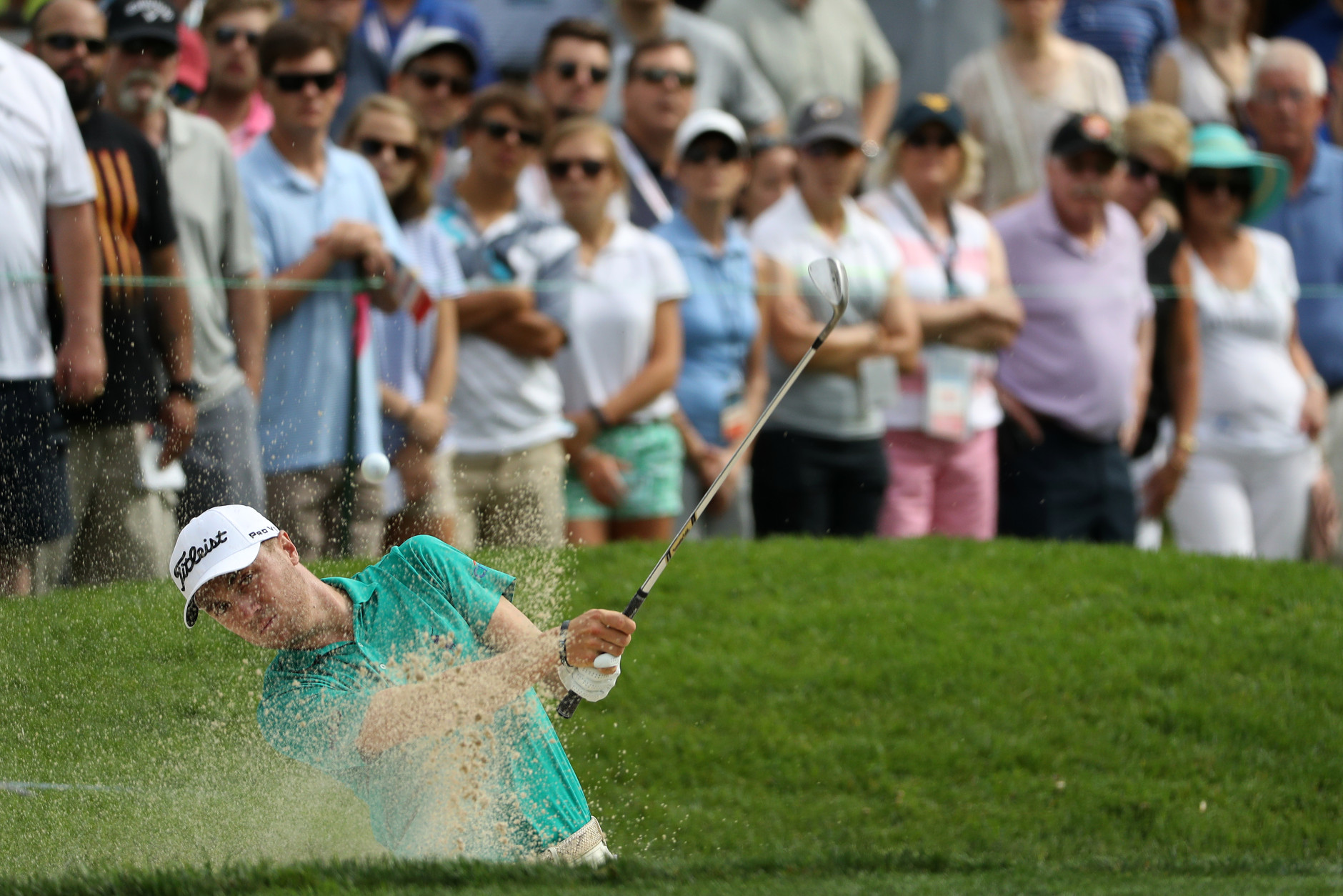 BETHESDA, MD - JUNE 24:  Justin Thomas plays a shot from a bunker on the 14th hole during the second round of the Quicken Loans National at Congressional Country Club on June 24, 2016 in Bethesda, Maryland.  (Photo by Patrick Smith/Getty Images)
