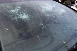 A car damaged by hail in Middleburg, Virginia, June 17, 2016. (WTOP/Nick Iannelli)