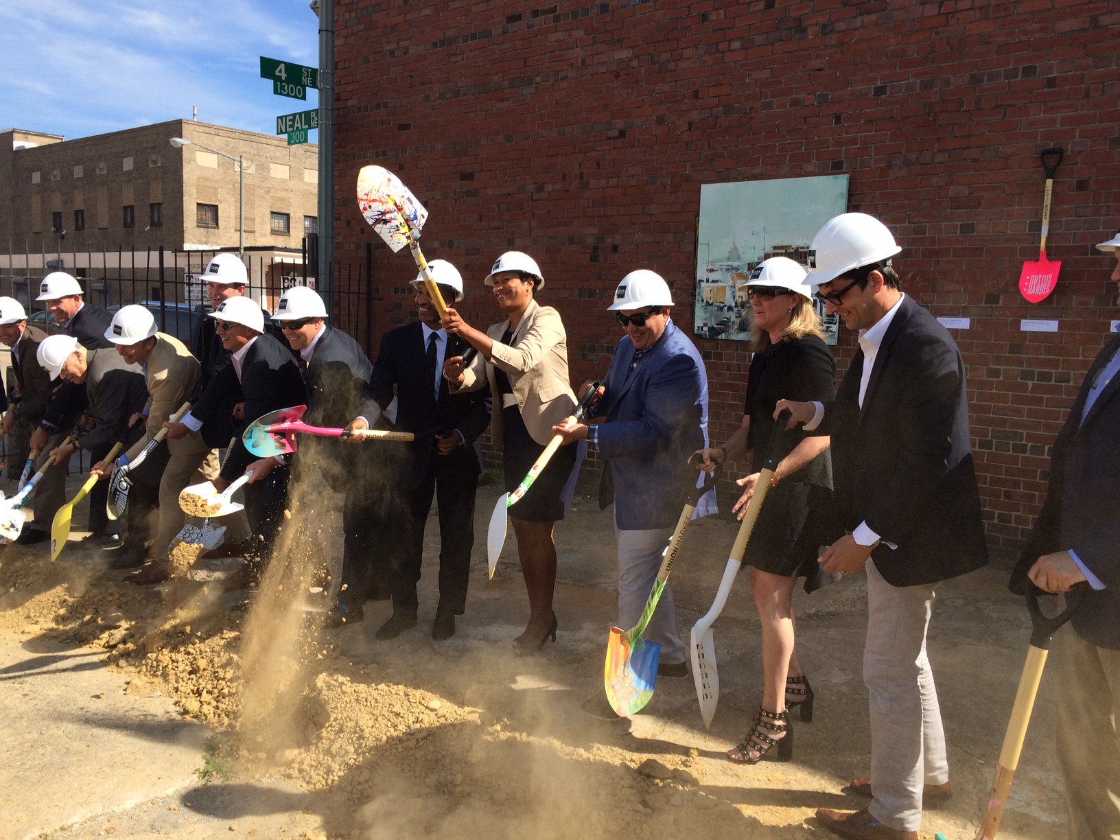 On June 13, chef Jose Garces joined D.C. Mayor Muriel Bowser, along with a handful of elected officials and real-estate developers, to break ground on a new mixed-use project at 1270 4th St. NE. (WTOP/Rachel Nania) 