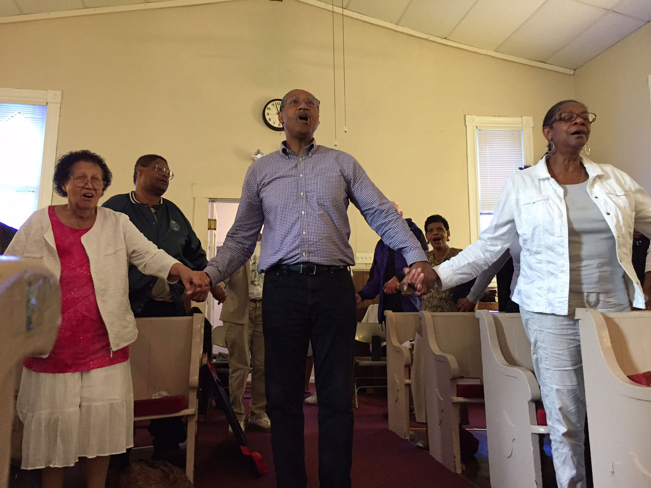 Residents worshiping in the historic Pleasant View Methodist Episcopal Church. (WTOP/Kate Ryan)