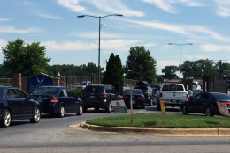 Cars line up outside the closed gate to Joint Base Andrews in Prince George's County on Thursday, June 30, 2016. The base was placed on lockdown after an active shooter was reported just before an active shooter drill was about to start. Defense Sec. Ash Carter said the drill was mistaken for a real threat. (WTOP/Darci Marchese)
