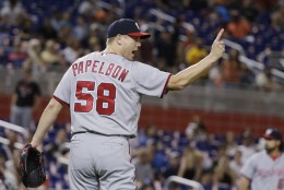 Washington Nationals relief pitcher Jonathan Papelbon celebrates after the Nationals defeated the Miami Marlins 4-1 in a baseball game, Friday, May 20, 2016, in Miami. (AP Photo/Wilfredo Lee)