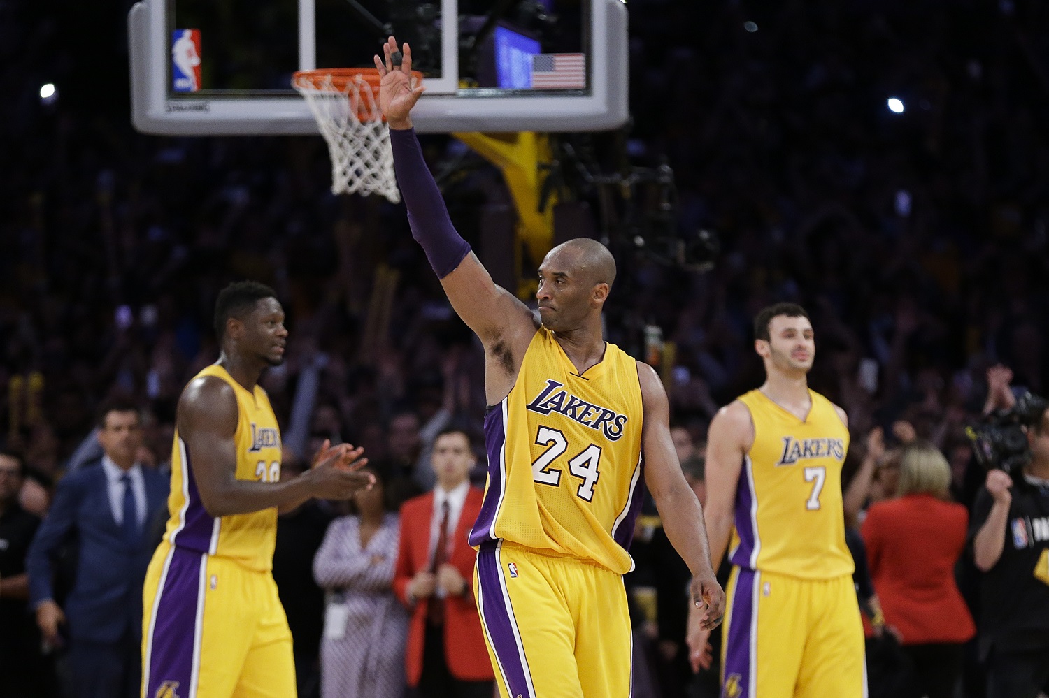 Los Angeles Lakers' Kobe Bryant acknowledges the fans after the last NBA basketball game of his career, against the Utah Jazz on Wednesday, April 13, 2016, in Los Angeles. Bryant scored 60 points as the Lakers won 101-96. (AP Photo/Jae C. Hong)