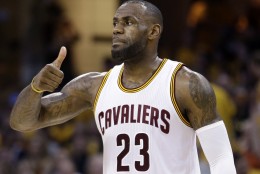 Cleveland Cavaliers' LeBron James (23) gestures during the first half against the Toronto Raptors in Game 2 of the NBA basketball Eastern Conference finals Thursday, May 19, 2016, in Cleveland. (AP Photo/Tony Dejak)