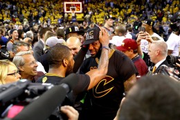 LeBron James #23 and Kyrie Irving #2 of the Cleveland Cavaliers celebrate after defeating the Golden State Warriors 93-89 in Game 7 of the 2016 NBA Finals at ORACLE Arena on June 19, 2016 in Oakland, California. (Photo by Ezra Shaw/Getty Images)