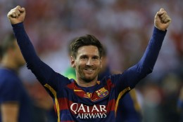 Barcelona's Lionel Messi celebrates after winning the final of the Copa del Rey soccer match between FC Barcelona and Sevilla FC at the Vicente Calderon stadium in Madrid, Sunday, May 22, 2016. Barcelona won 2-0 (AP Photo/Francisco Seco)