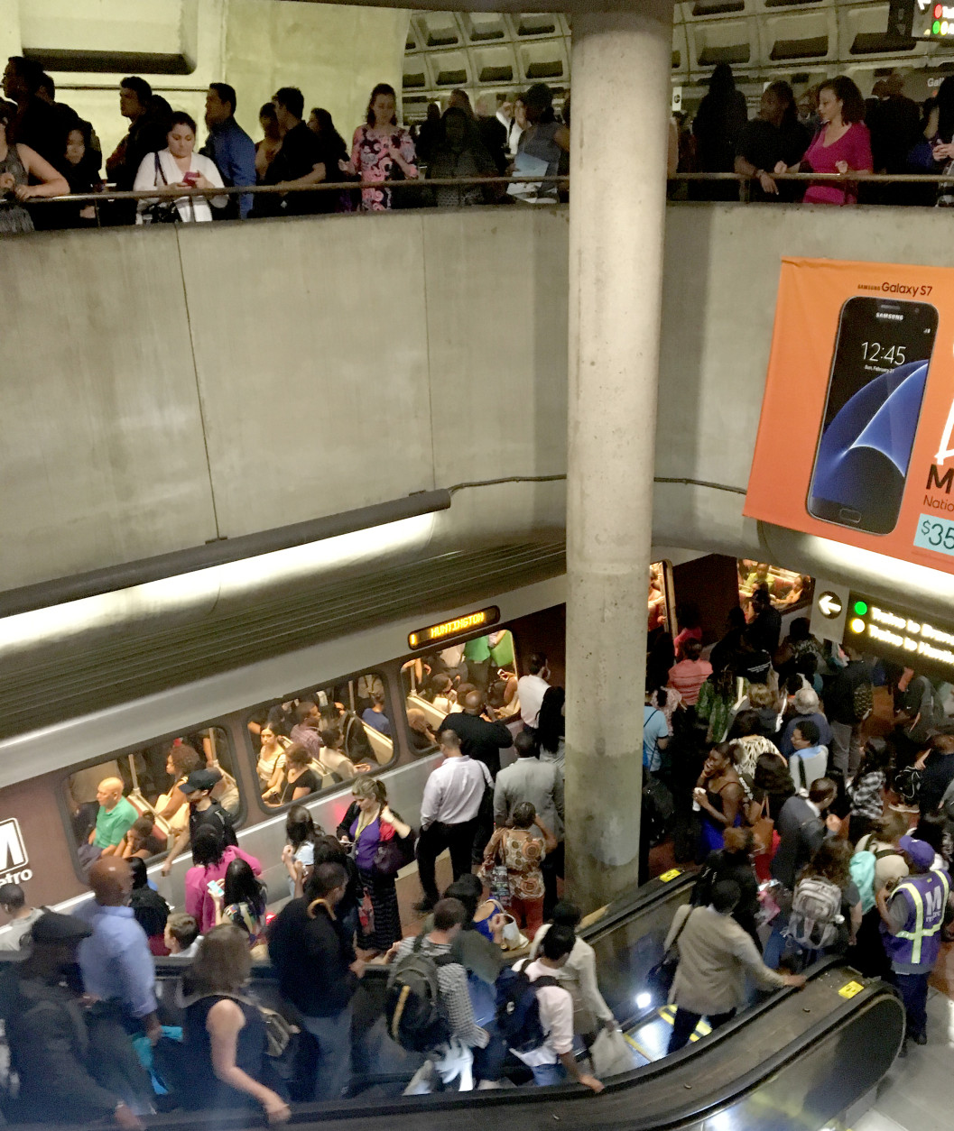 Residual crowding persists at the Gallery Place Metrorail station, where track debris triggered delays and forced inbound and outbound trains to share a single track on Thursday, June 23, 2016. (WTOP/Tiffany Arnold)