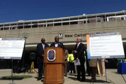 Prince George's County Executive Rushern Baker, center, tells residents that the upcoming Metro track shutdown between Eastern Market and the Benning Road and Minnesota Avenue stations will be disruptive. County leaders encouraged Metro riders to avoid the subway and to either telework, flex their work hours or to find another mass transit option during the 16-day closure that begins June 18. (WTOP/Neal Augenstein)