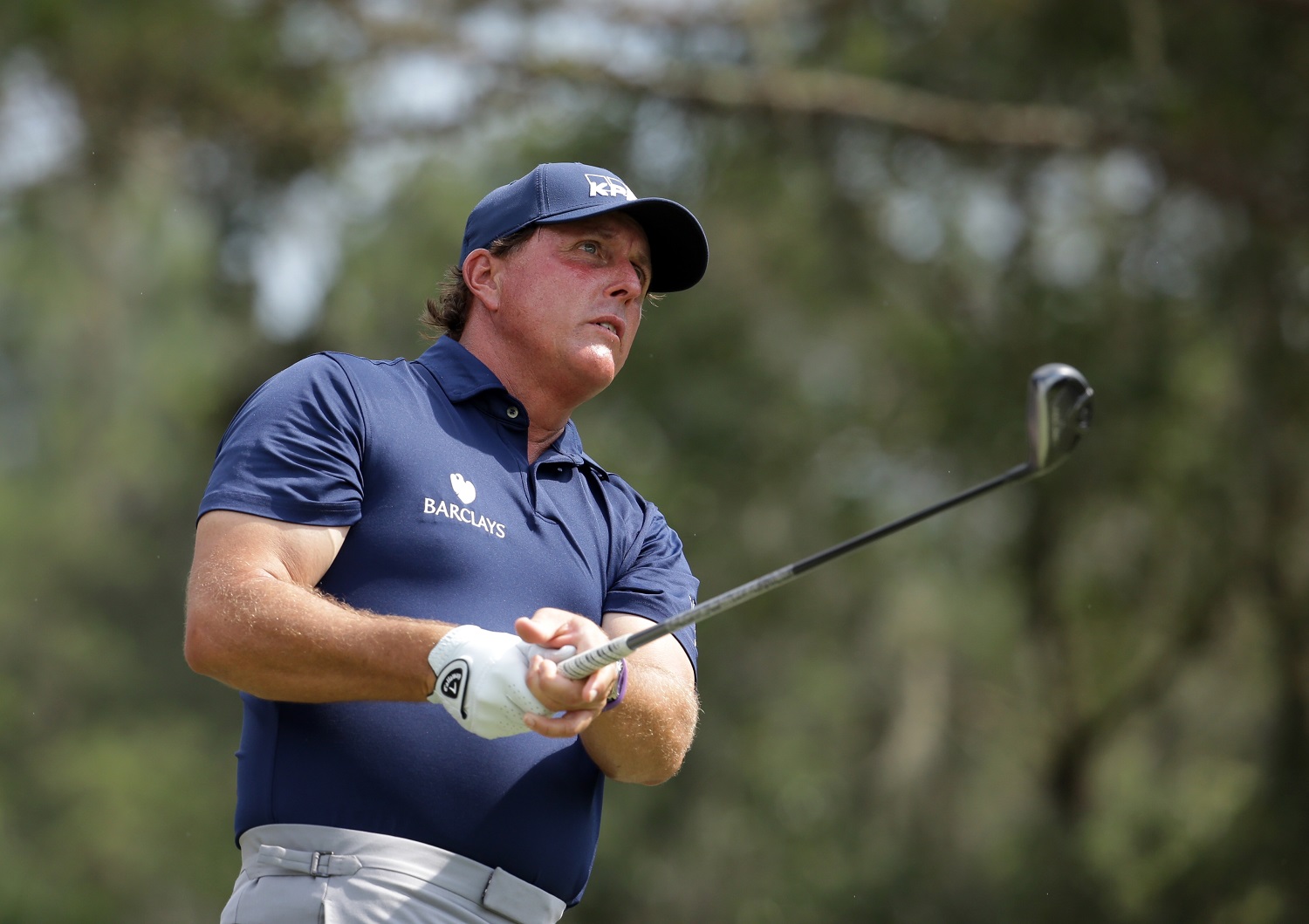 Phil Mickelson follows his shot from the ninth tee during the second round of The Players Championship golf tournament Friday, May 13, 2016, in Ponte Vedra Beach, Fla. (AP Photo/Lynne Sladky)