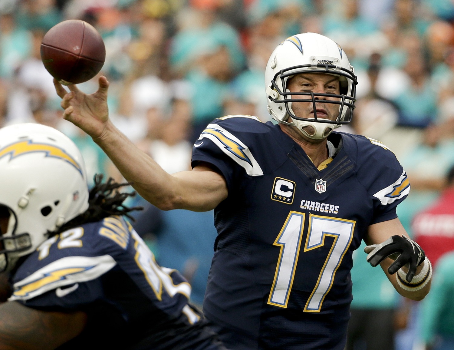 San Diego Chargers quarterback Philip Rivers passes against the Miami Dolphins during the first half in an NFL football game Sunday, Dec. 20, 2015, in San Diego. (AP Photo/Gregory Bull)